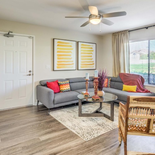 Beautiful living areas to match your lifestyle a living room with a fan