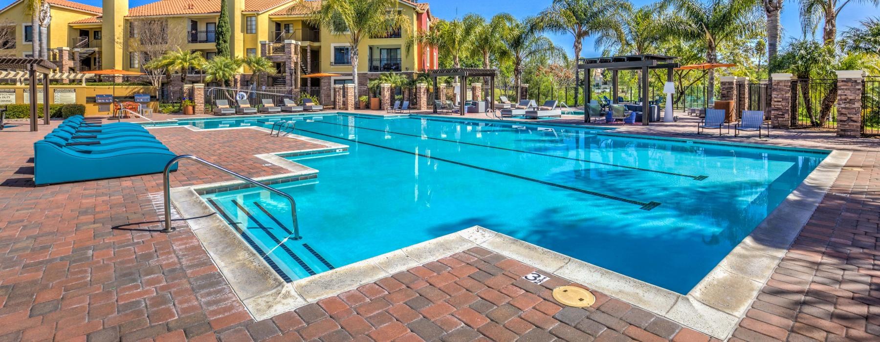 a swimming pool in front of a building