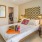 a bedroom with a large bed