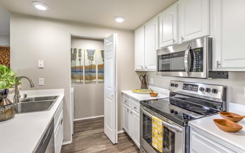 Modern kitchen with stainless steel appliances at Overlook at Bernardo Heights San Diego apartments